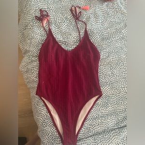 Maroon one-piece swim suit